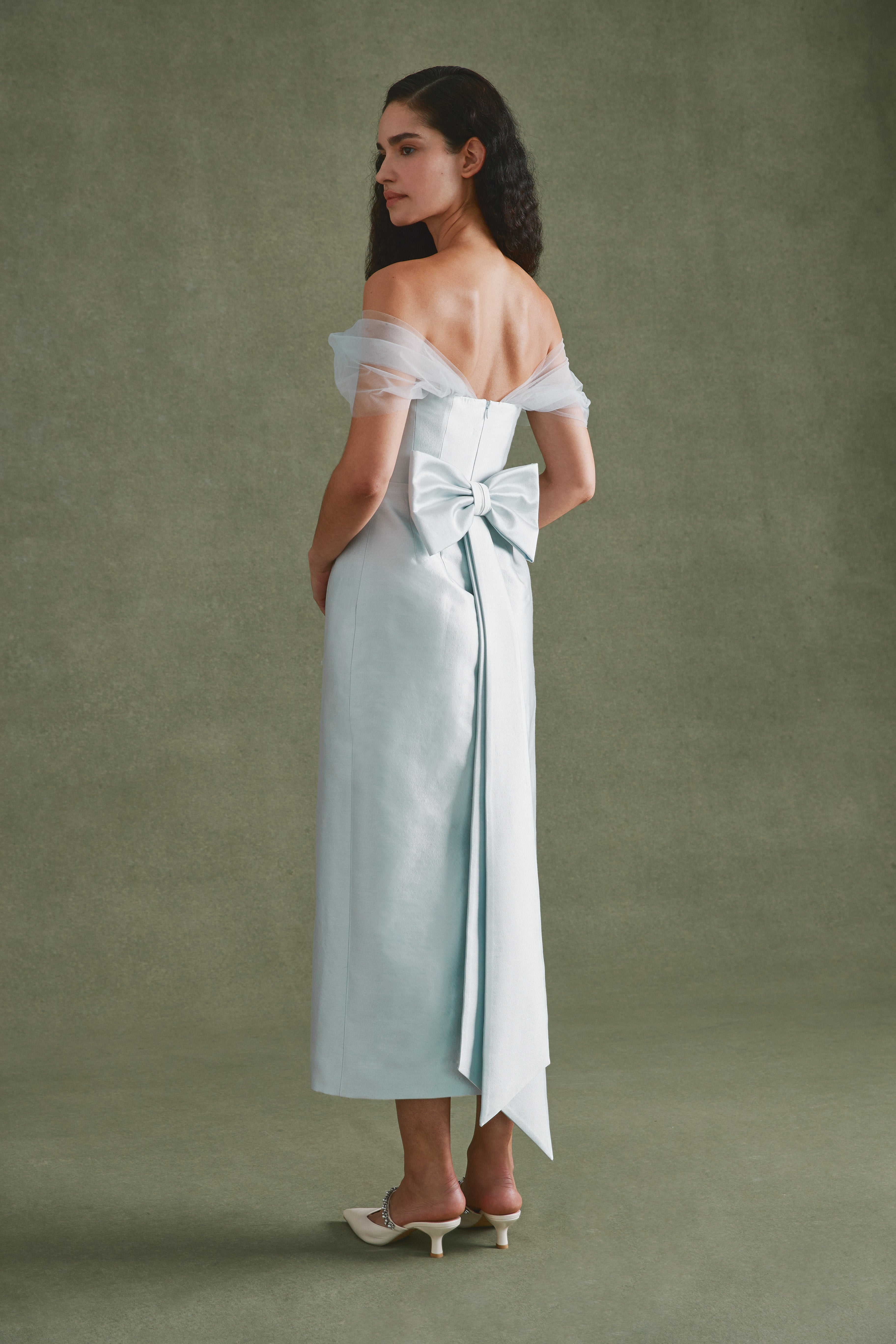 Alexandra Pijut Sylvie Dress in light blue silk wool with tulle sleeves. Midi dress, wedding guest, black tie, bridal, outfit.  Mother of the bride, groom.