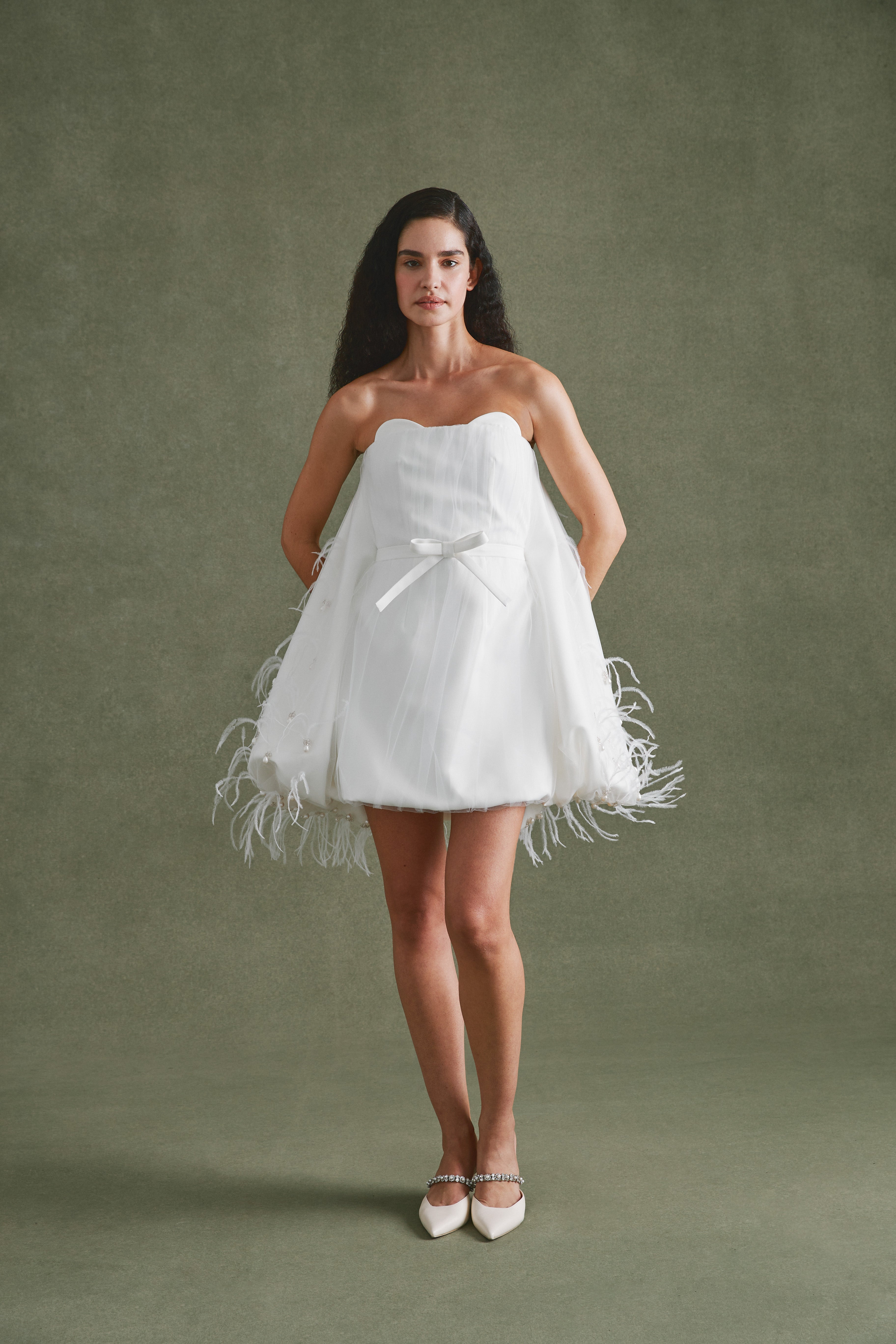Alexandra Pijut Cloud Dress. Ivory satin mini dress with pearl and feather embellishments. After party, rehearsal dinner outfit.