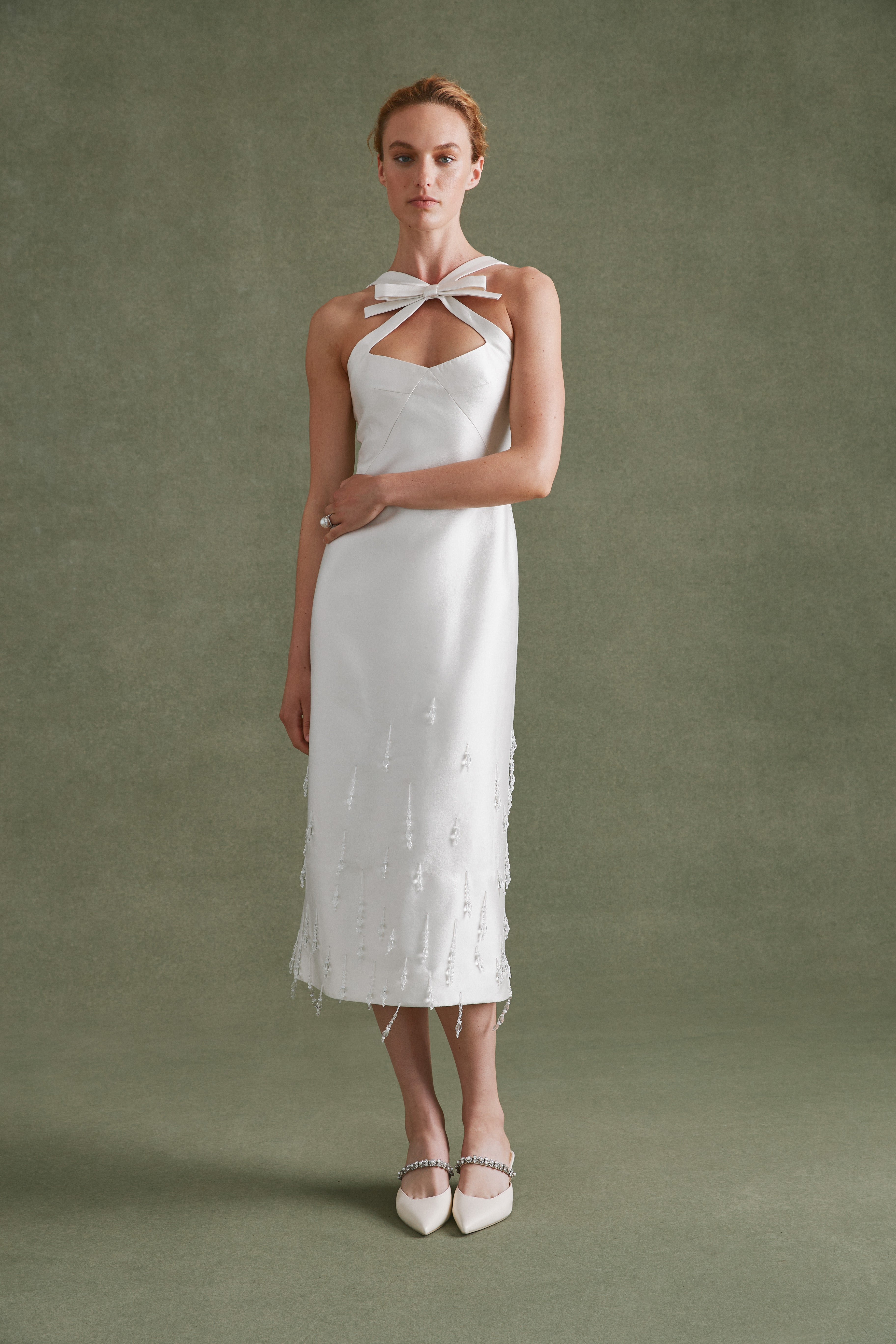 Alexandra Pijut Delphine Dress. Ivory silk wool bridal dress with bow and beading. Midi dress. Rehearsal dinner, wedding dress, welcome dinner, after party dress.