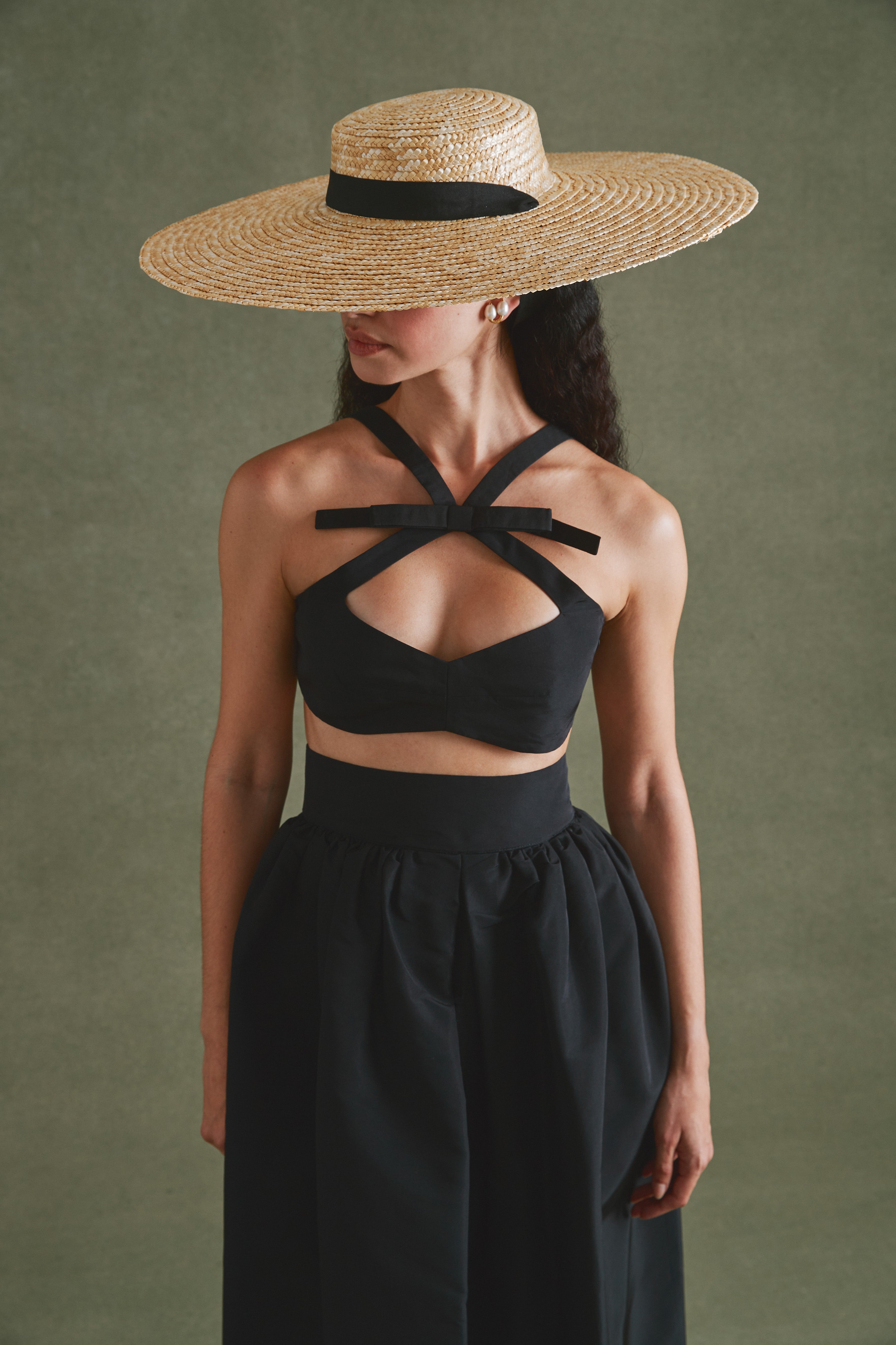Alexandra Pijut Olivia Bow Set. Skirt and bra top with bow in silk falle. Wedding guest, black tie outfit.