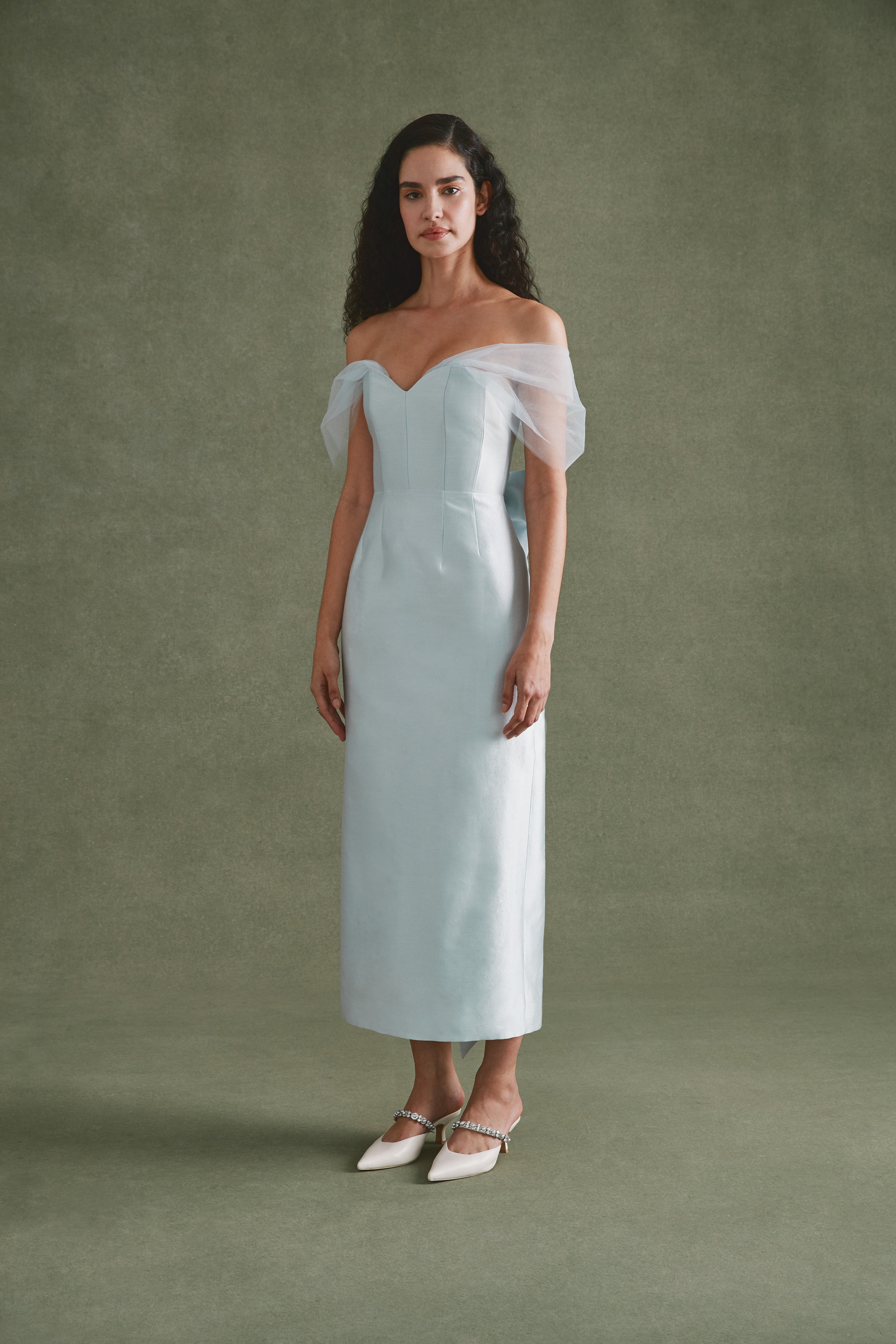 Alexandra Pijut Sylvie Dress in light blue silk wool with tulle sleeves. Midi dress, wedding guest, black tie, bridal, outfit.  Mother of the bride, groom.